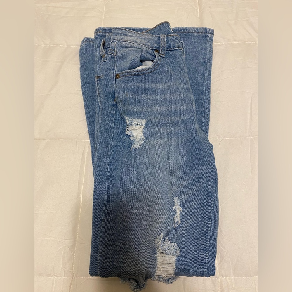 90 bootcut style jeans also known as bell bottoms. Vintage